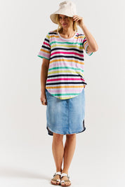 A model wearing the Ariana Cotton Tee in colour Rainbow, from the front, showing the whole outfit