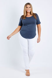Model Fiona wearing size 16 of the Ariana Tee in colour Indiblue (Blue), from the front, showing the whole outfit