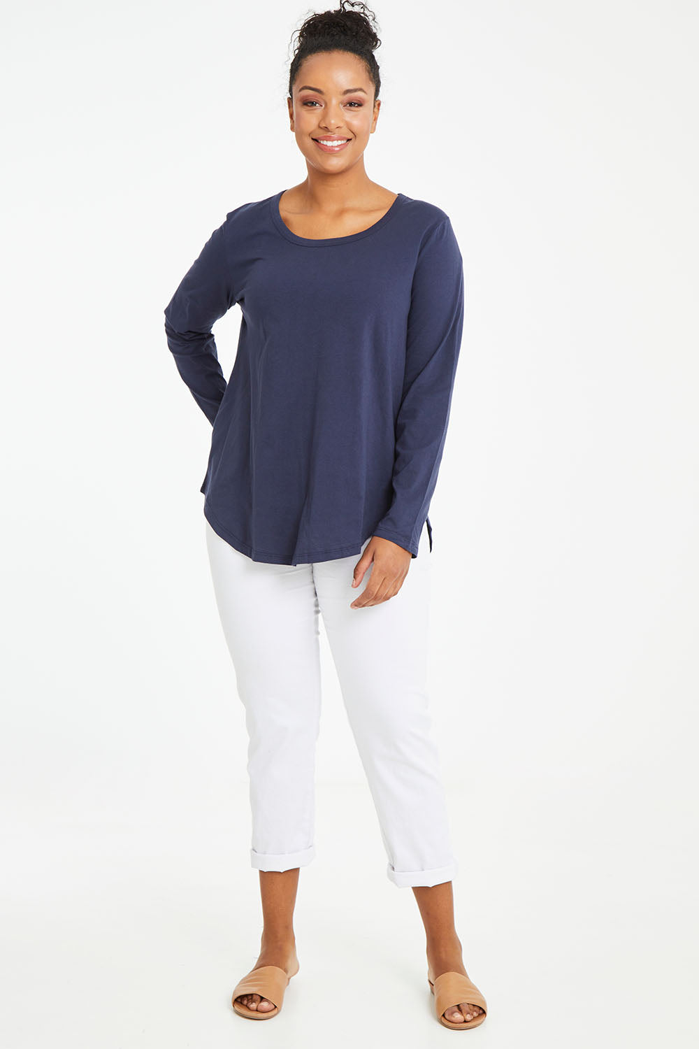Model Noli wearing size 14 of the Megan Long Sleeve Top in colour Newnavy (Blue), from the front, showing the whole outfit