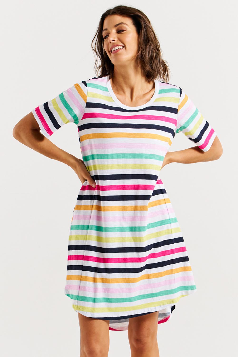 A model wearing the Nyree Cotton Dress in colour Rainbowstr, from the front, cropped image