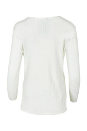 Product shot of the Cable Mini Jumper in colour Oat, from the back