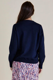 A model wearing the Leon Cotton Blend Knit Cardigan in colour Navy (Blue), from the front, cropped image