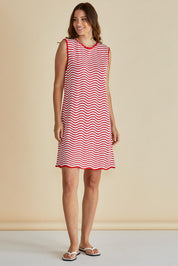 A model wearing the Viola Cotton Tank Dress in colour Redwhite (Red), from the front, showing the whole outfit