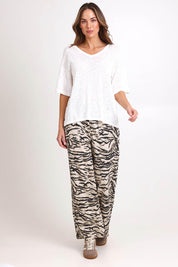 Model Madelinec wearing size 10 of the Aries V-Neck Sweater – White in colour White, from the front