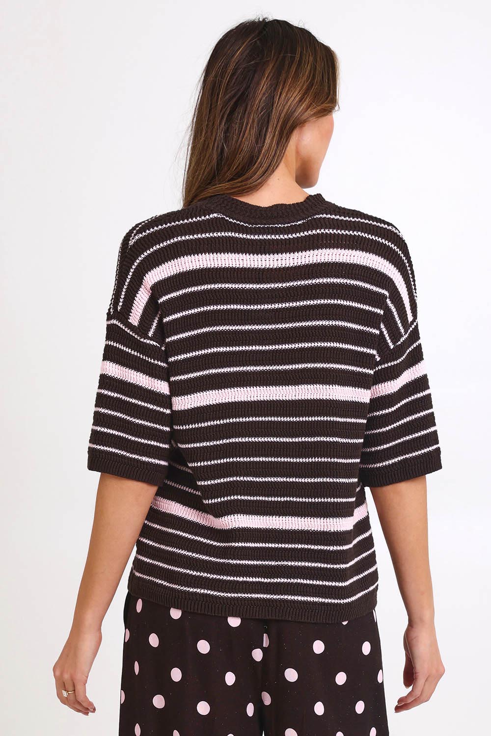 Model Madelinec wearing size 10 of the Dylan Knit Tee – Chocolate in colour Chocolate, from the back