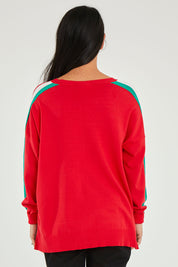 Model Katie wearing size 10 of the Amelia Knit in colour Raspberry (Red), from the back