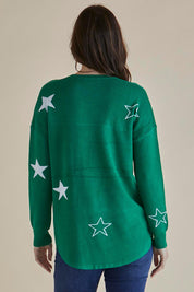 A model wearing the Sophie Knit Jumper in colour Greenstar (Green), from the back