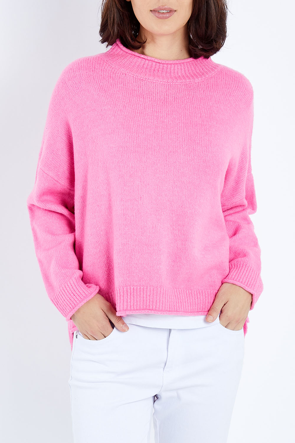 Model Andrea wearing size S of the Jemima Knit in colour Orchid (Pink), from the front, cropped image