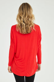 Model Alice wearing size 10 of the Oslo Top in colour Redalert (Red), from the back