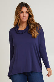 Model Laura wearing size 14 of the Cowl Bamboo Top in colour Navy (Blue), from the front, cropped image