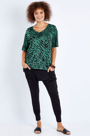 Model Lala wearing size 10 of the Barcelona Pant in colour Black (Black), from the front, showing the whole outfit