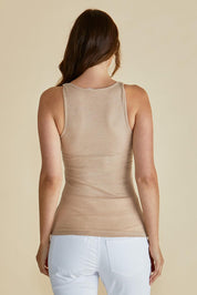 A model wearing the Tiana Cotton Blend Tank in colour Beige, from the back
