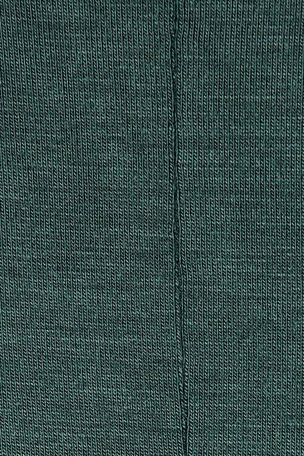 Product shot of the Maui Stretch Tee in colour Ivy (Green), detail