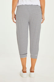 Model Georgia wearing size 10 of the Tokyo Stretch 3/4 Pant in colour Noirstripe (Black), from the back