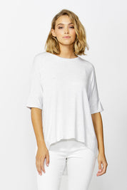 A model wearing the Wellington Tee in colour HeatheGrey (Grey), from the front, cropped image