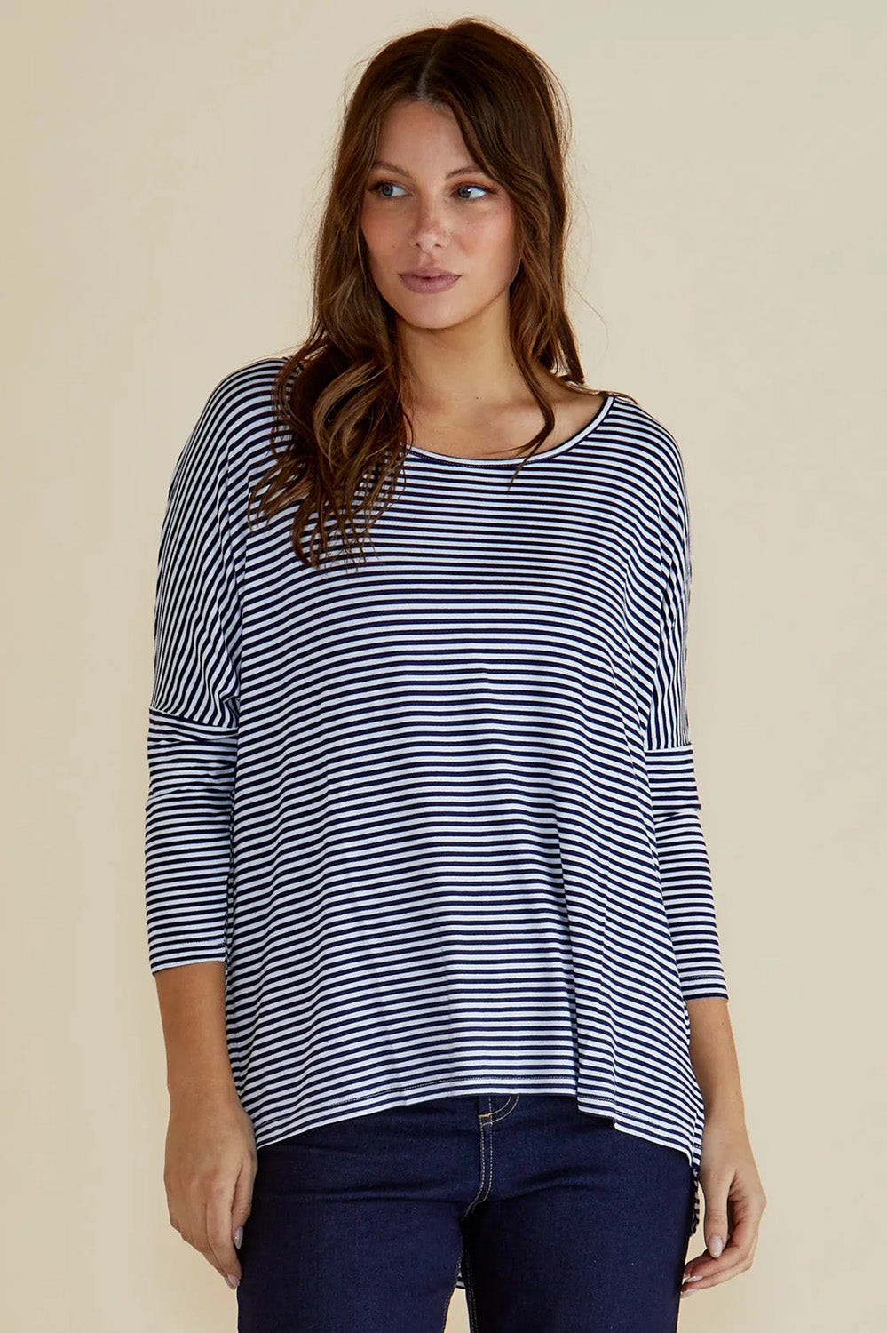 A model wearing the Milan Stretch Top in colour NavyWhtStr (Blue), from the front, cropped image