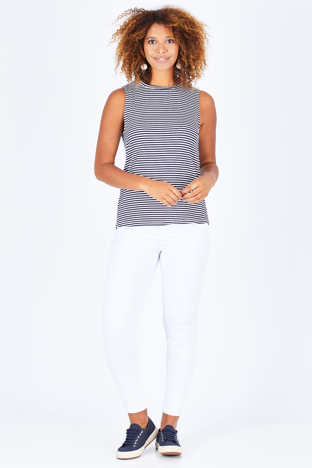 Model Summer wearing size 10 of the Capri Tank in colour NavyStripe (Blue), from the front, showing the whole outfit