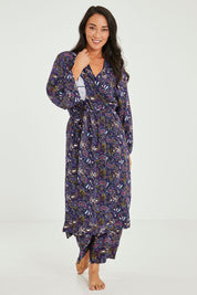 Model Katie wearing size S of the Roya Robe in colour Paisley (Blue), from the front, showing the whole outfit