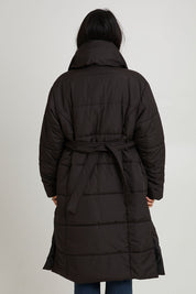 Model Katie wearing size 10 of the Shawl Puffer Jacket in colour Black (Black), from the back