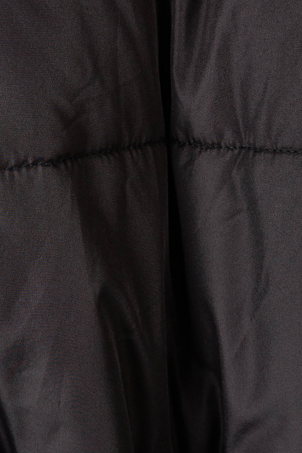 Product shot of the Shawl Puffer Jacket in colour Black (Black), detail
