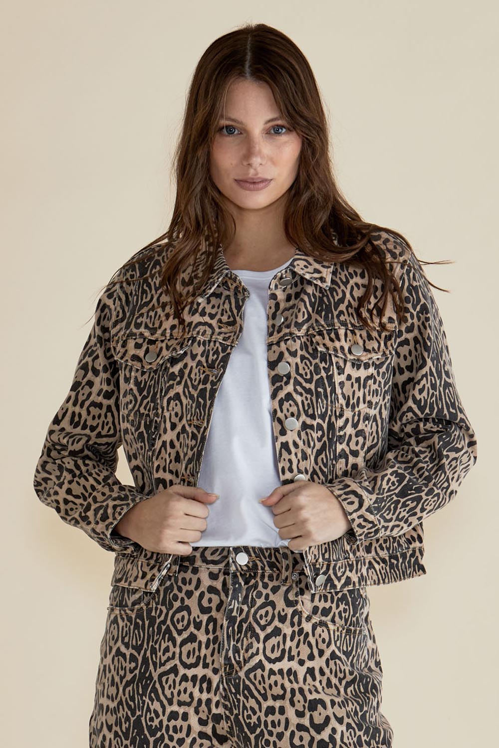 A model wearing the Lucca Leopard Print Jacket in colour Leopard, from the front, cropped image