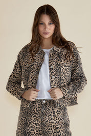 A model wearing the Lucca Leopard Print Jacket in colour Leopard, from the front, cropped image