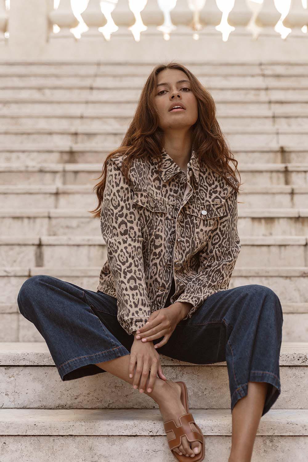 A model wearing the Lucca Leopard Print Jacket in colour Leopard, from the front, showing the whole outfit