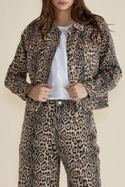 A model wearing the Lucca Leopard Print Jacket in colour Leopard, from the front, showing the whole outfit