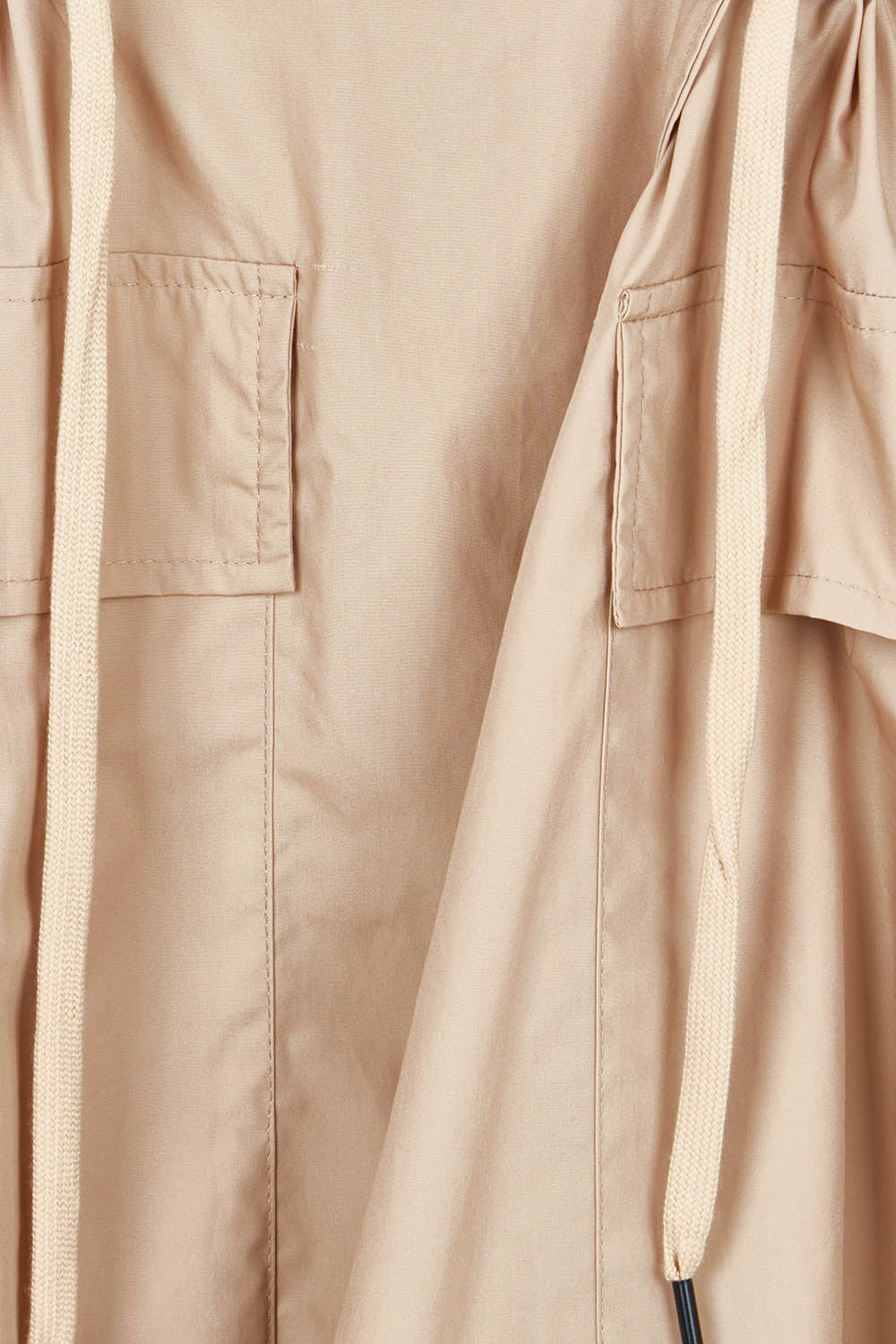 Product shot of the Parker Coat in colour Pebble, detail