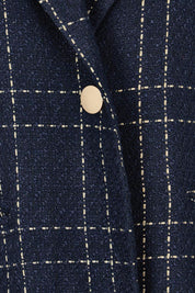Product shot of the Genevieve Coat in colour Navycheck (Blue), detail
