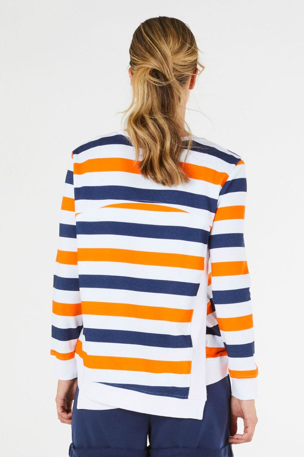 A model wearing the Ryder Sweat in colour Stripe (Blue), from the back