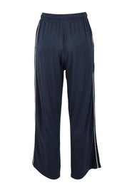 Product shot of the Evelyn Wide Leg Jogger in colour Petrol (Blue), from the back