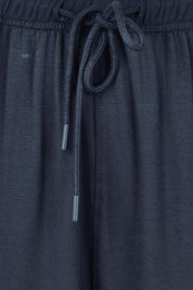 Product shot of the Evelyn Wide Leg Jogger in colour Petrol (Blue), detail
