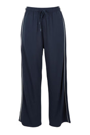 Product shot of the Evelyn Wide Leg Jogger in colour Petrol (Blue), from the front