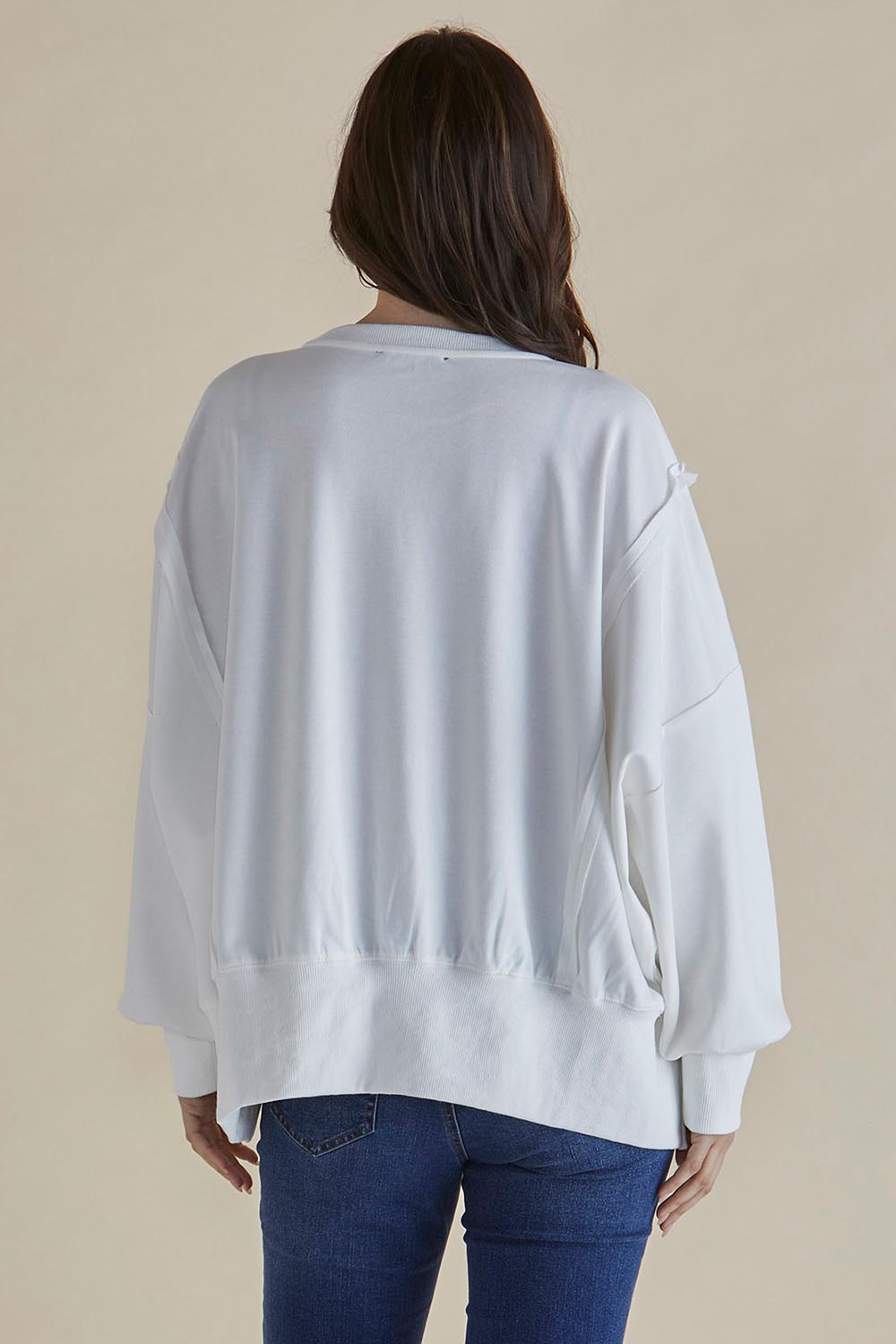 A model wearing the Mykie Cotton Blend Jumper in colour Print (White), from the back