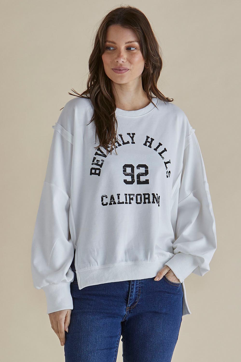 A model wearing the Mykie Cotton Blend Jumper in colour Print (White), from the front, cropped image