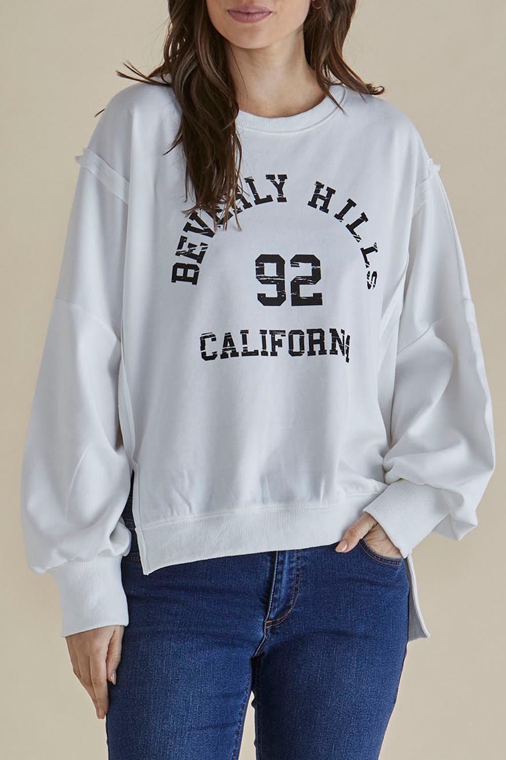 A model wearing the Mykie Cotton Blend Jumper in colour Print (White), from the front, cropped image