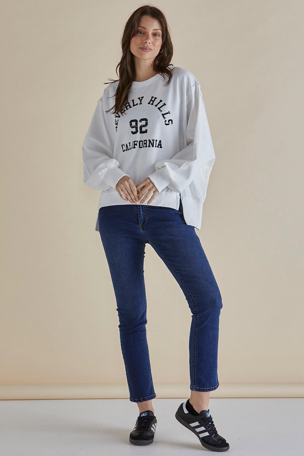 A model wearing the Mykie Cotton Blend Jumper in colour Print (White), from the front, showing the whole outfit