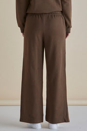 A model wearing the Pace Cotton Jogger in colour Chocolate, from the back