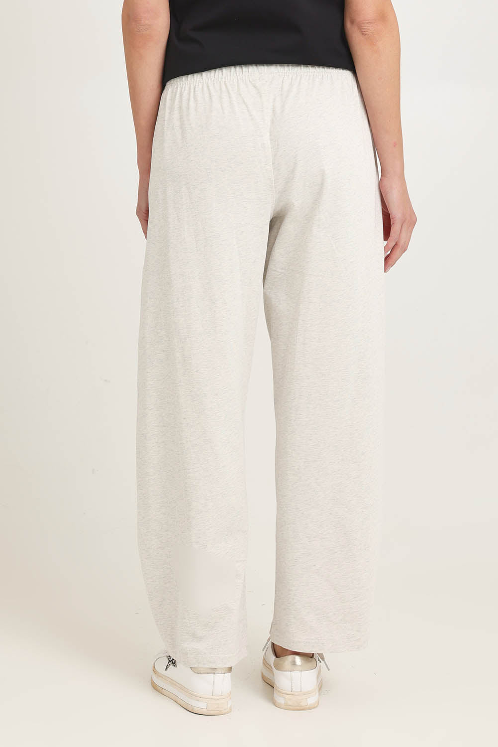 Model Madeline wearing size 10 of the Barrel Leg Cotton Sweatpant in colour Greymarle (Grey), from the back