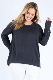 Model Jess wearing size 14 of the Dolly Sweat in colour Gunmetal (Grey), from the front, cropped image