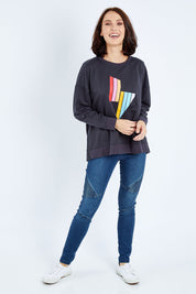 Model Andrea wearing size 10 of the Poppy Sweat in colour Bolt (Grey), from the front, showing the whole outfit