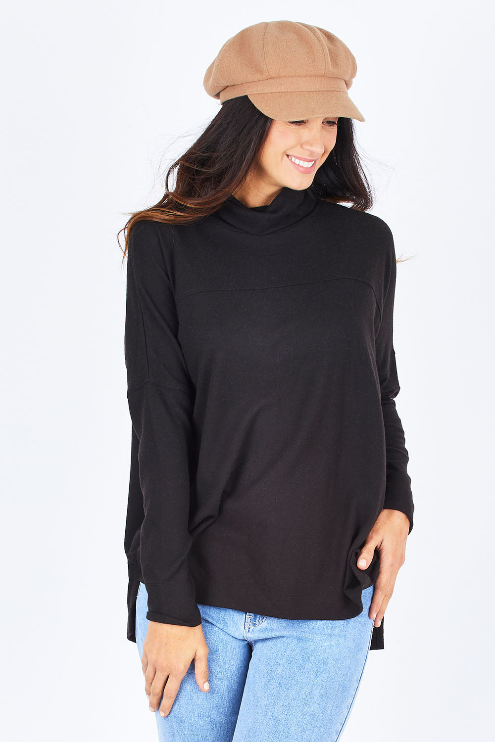 Model Gemma wearing size 10 of the Ivy Cosy Pullover in colour Black (Black), from the front, cropped image