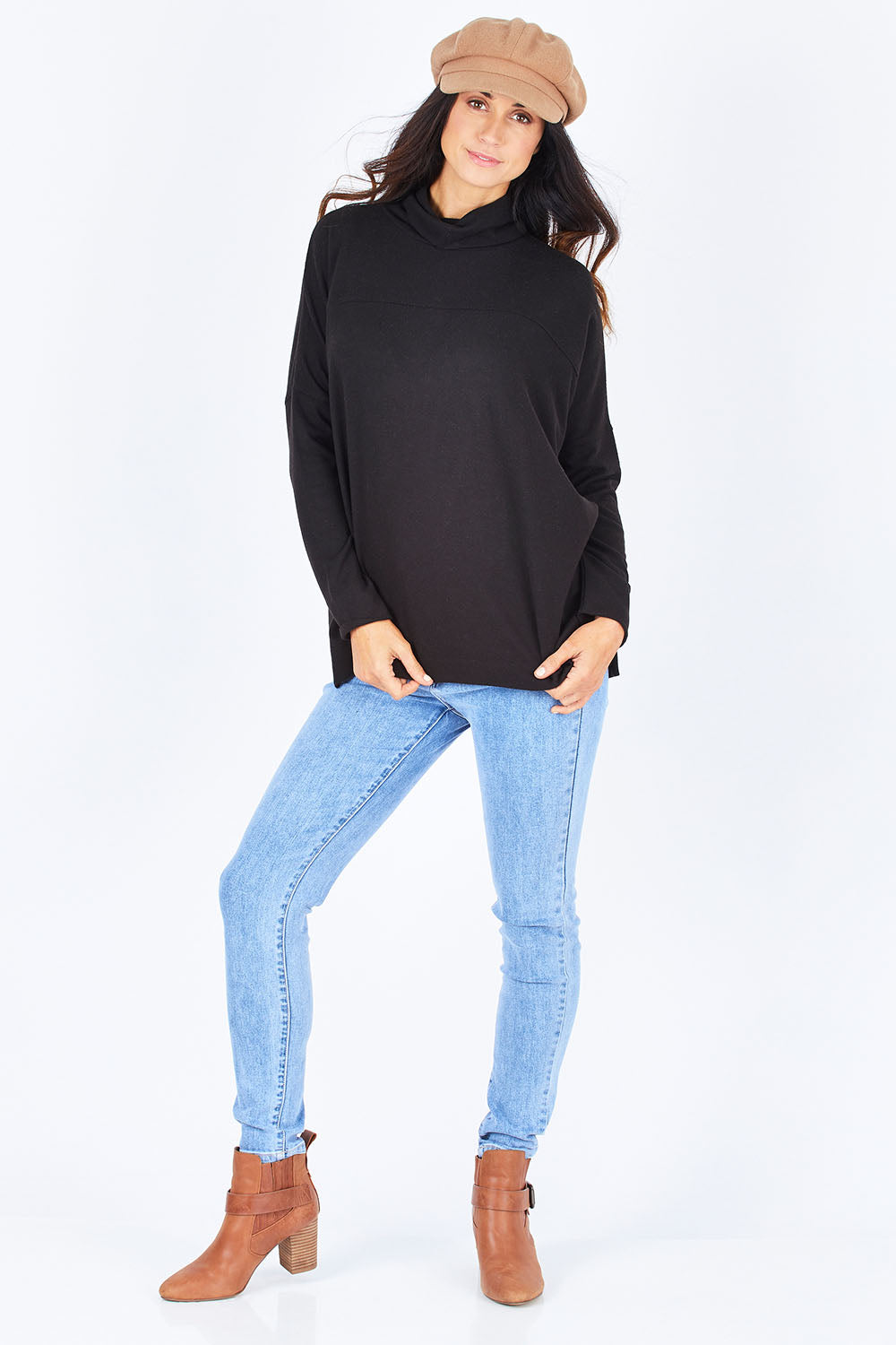 Model Gemma wearing size 10 of the Ivy Cosy Pullover in colour Black (Black), from the front, showing the whole outfit