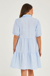 Model Georgia wearing size 10 of the Hayley Dress in colour Blue, from the back