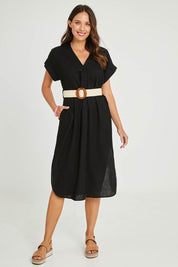 Model Madeline wearing size S of the Roma Linen Dress in colour Black (Black), from the front, showing the whole outfit