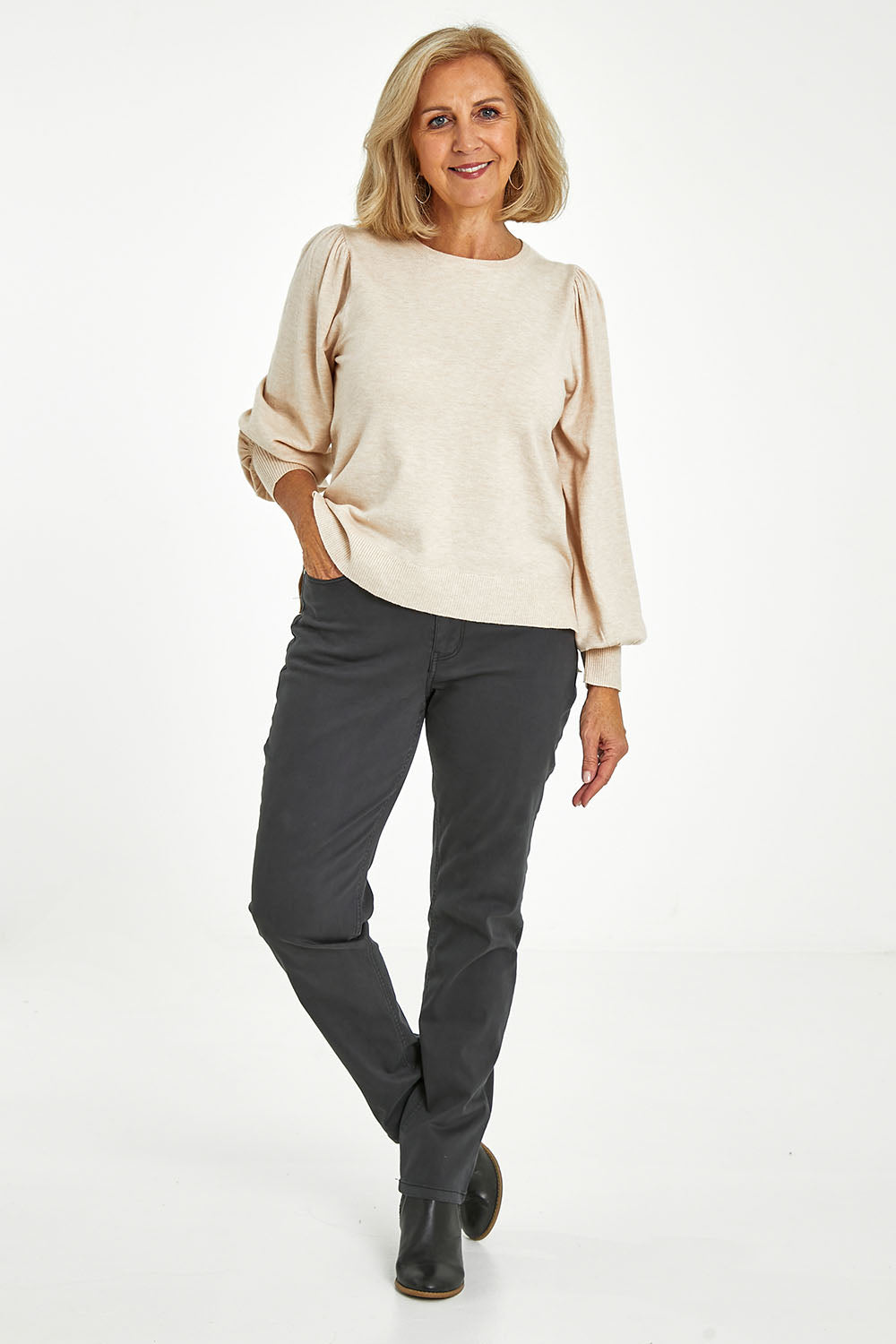 Model Sandy wearing size 10 of the Wynona Curve Jeans in colour Graphite (Black), from the front, showing the whole outfit