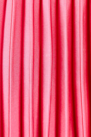 Product shot of the Louis Pleated Skirt in colour Peonypink (Pink), detail