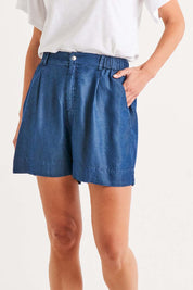 A model wearing the Gabriella Lyocell Short in colour Bluehaze (Blue), from the front, cropped image