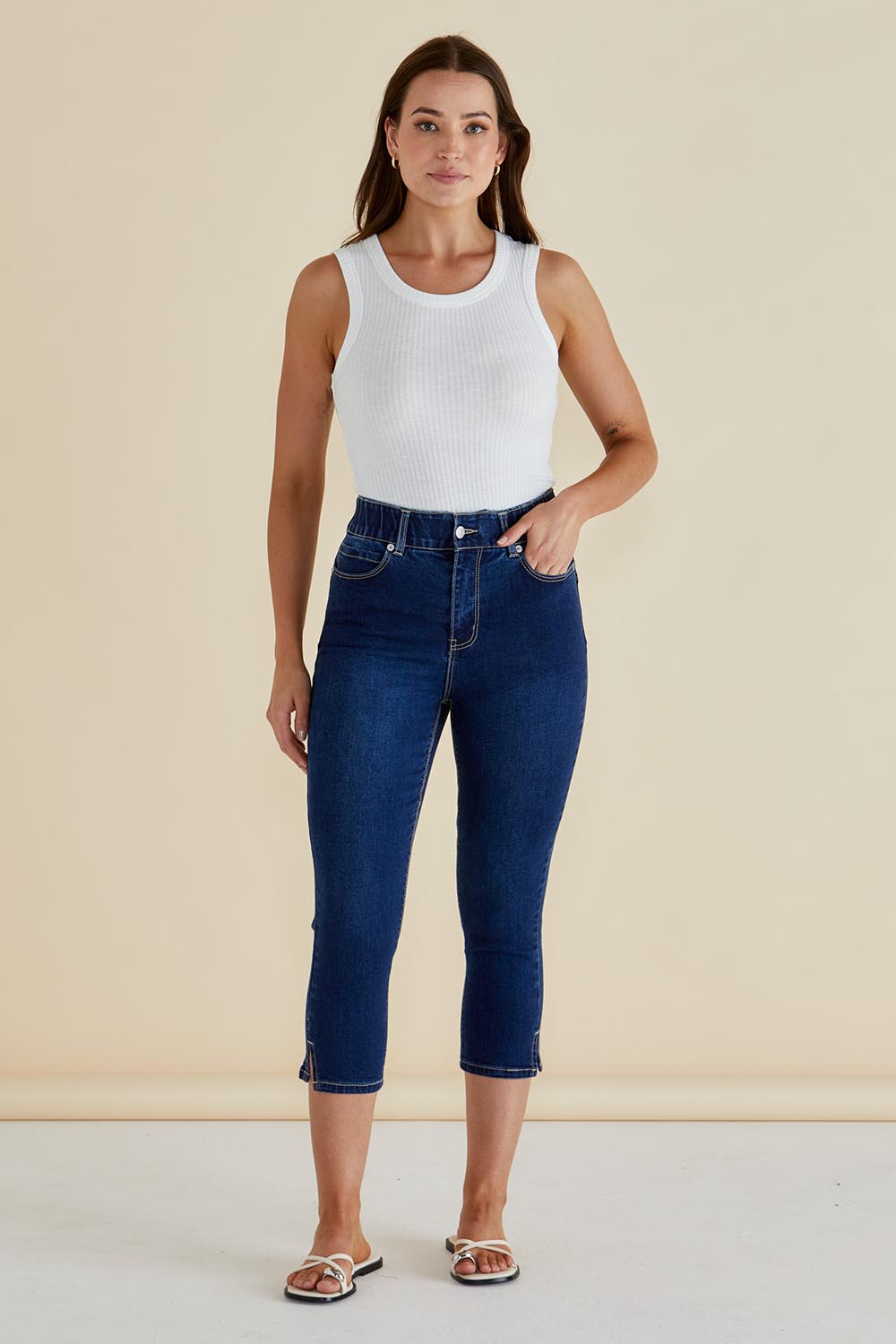 A model wearing the Camila Crop Jeans in colour Midnight (Blue), from the front, showing the whole outfit